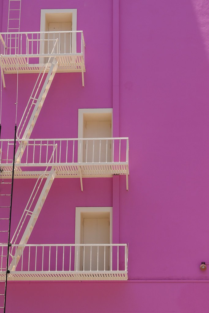Johny Vino abstract photograph of a pink fire escape