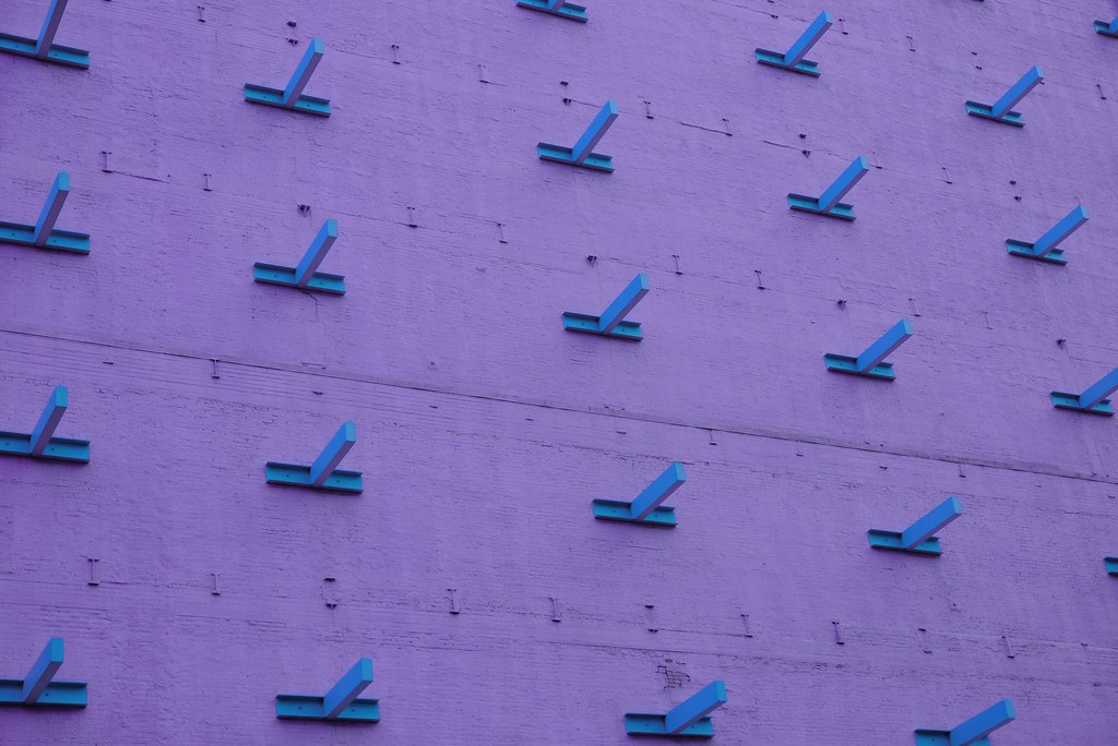Johny Vino abstract photograph of a purple airplane wall pattern