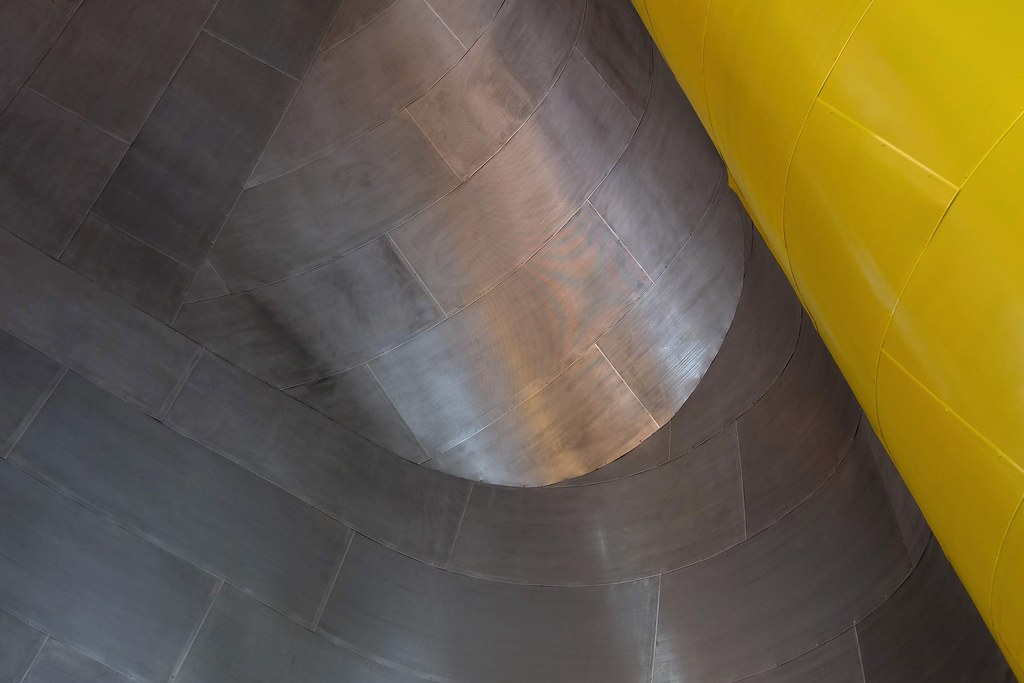 Johny Vino abstract photograph of yellow metal curves