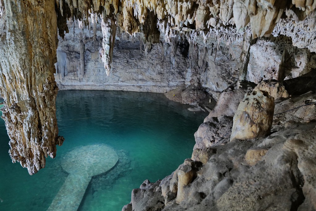 Johny Vino nature photograph of a limestone cave with turquoise water