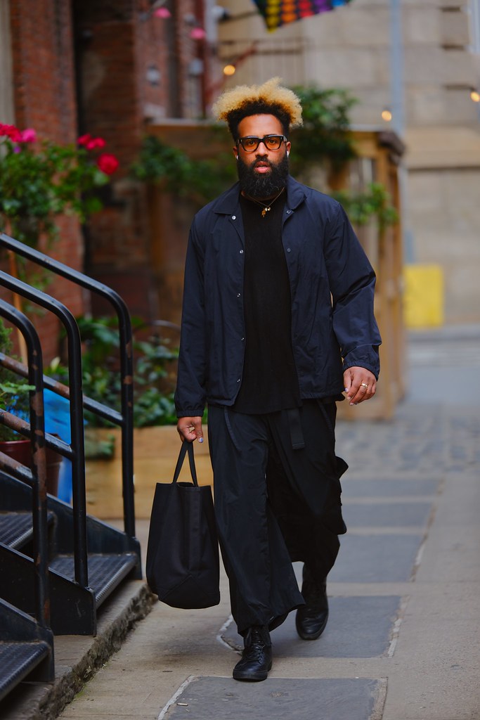 Johny Vino urban fashion portrait photograph of a man in a blue coat