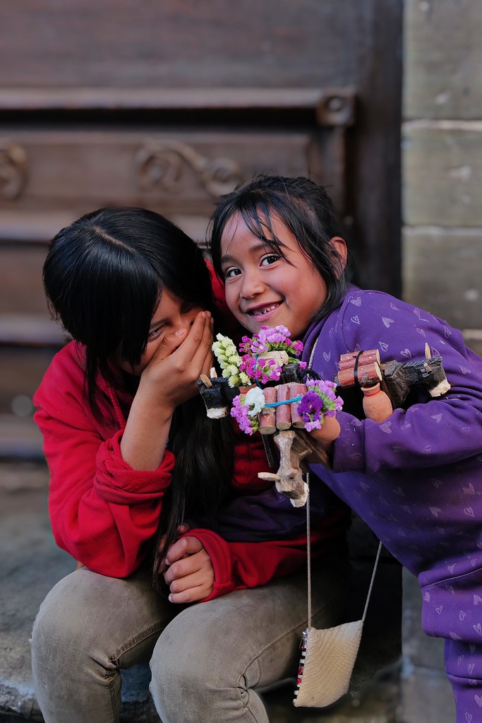 Johny Vino candid portrait photograph of children at a flower market