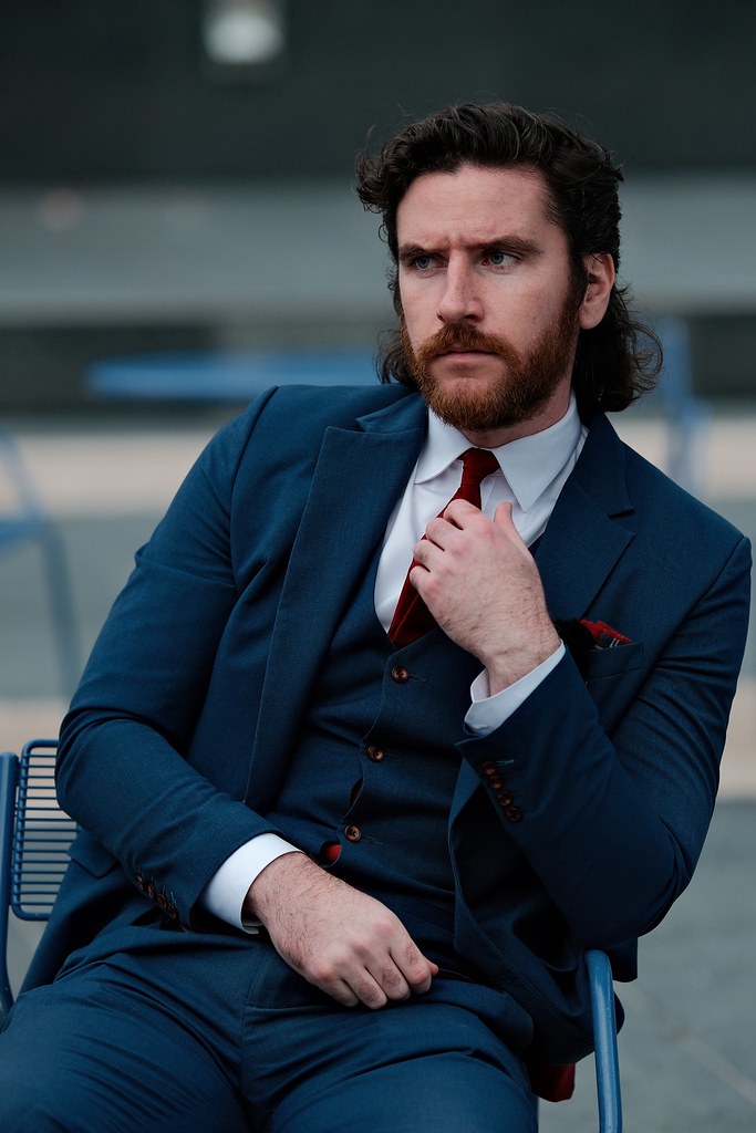 Johny Vino editorial portrait photograph of a man in a blue suit