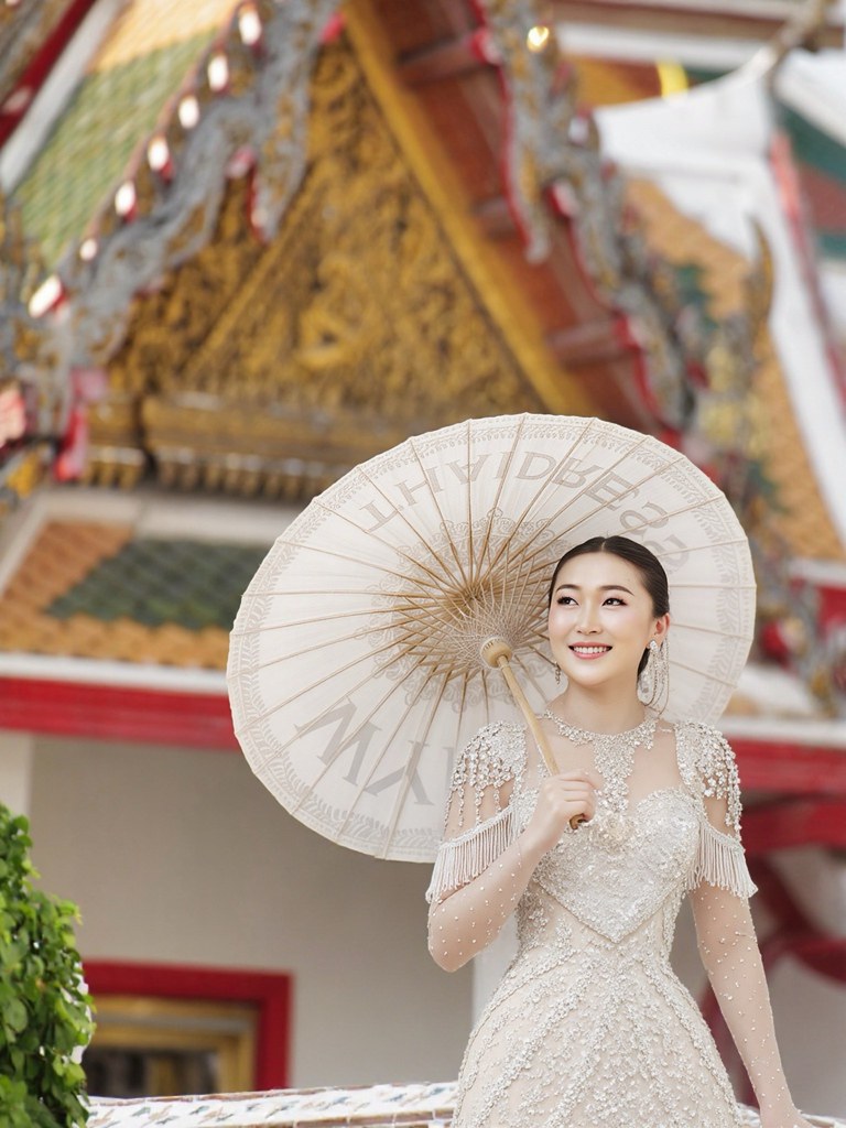 Johny Vino bridal fashion portrait photograph with a parasol