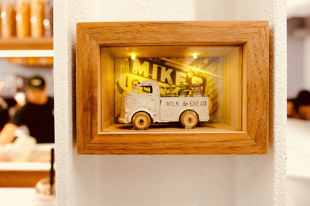 Johny Vino still life photograph of a framed toy truck miniature