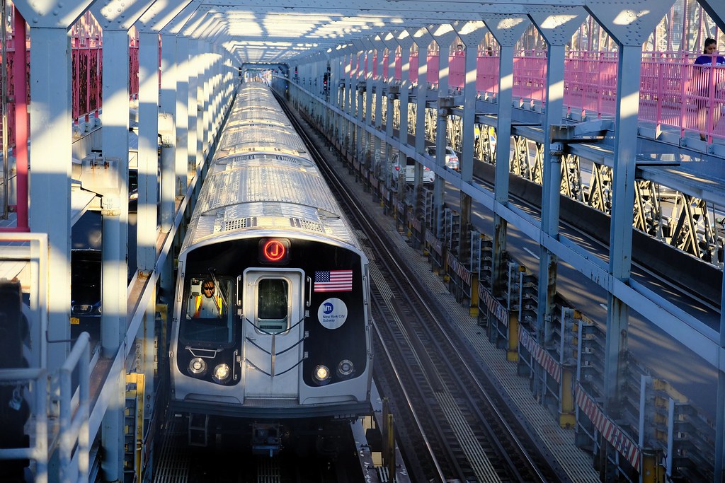 Johny Vino still life photograph of a subway train on a bridge